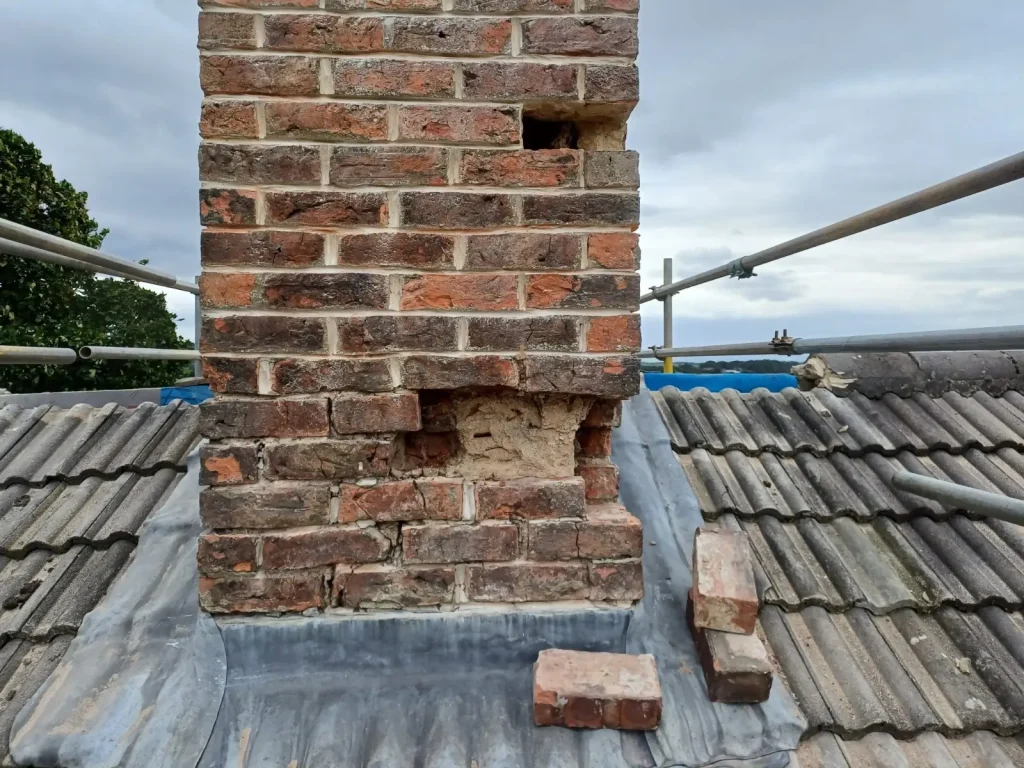 Chimney before repair, by AAA Roofing