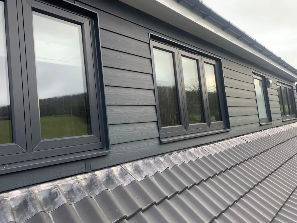 Cladding around dormer windows, by AAA Roofing