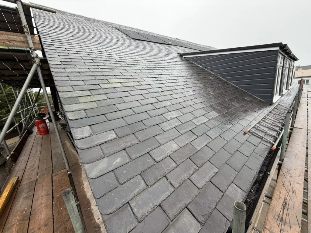 New slates around a dormer near Runswick Bay