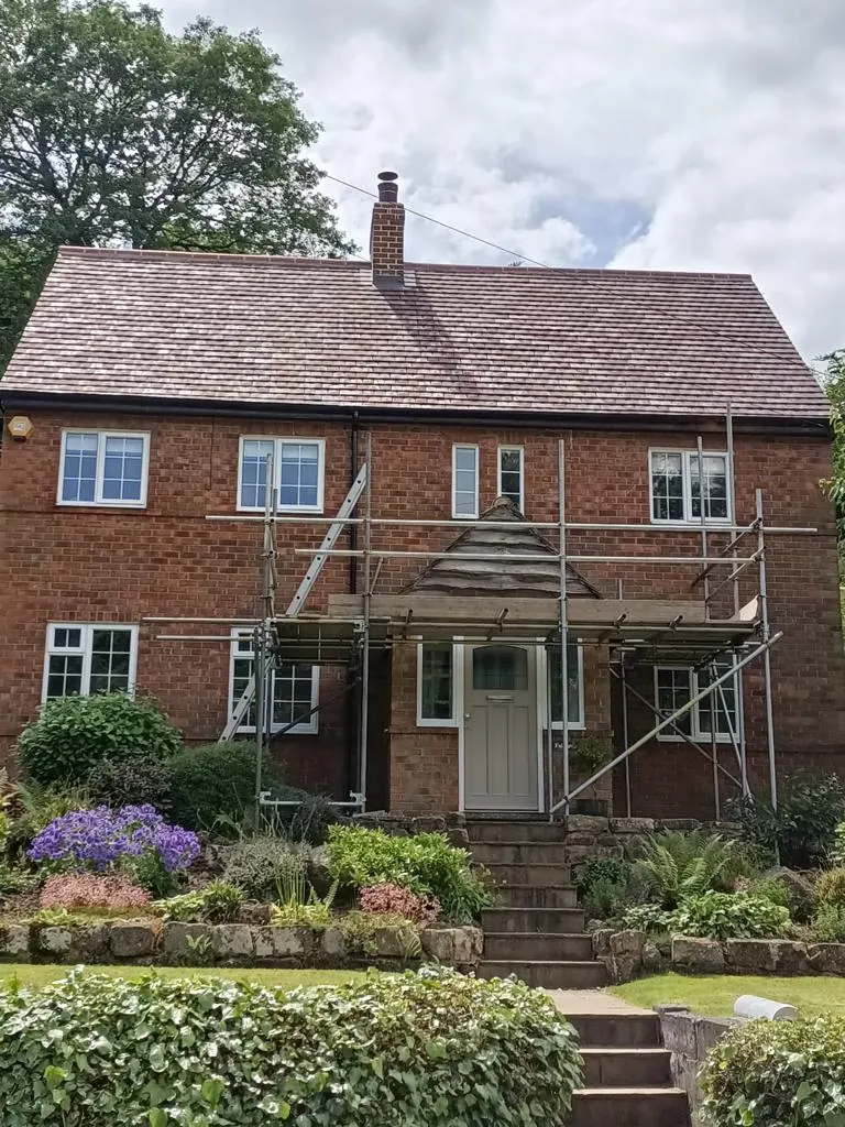 Detached house re-roofed in clay tiles